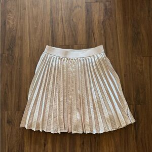Pleated skirt. Super cute. Swings.